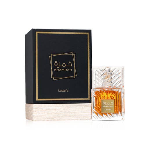 Lattafa Khamrah Eau de Parfum Flasche mit goldener Kappe und eleganter Verpackung auf weißem Hintergrund.